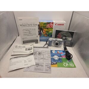 Canon PowerShot A10 1.3MP 3x Zoom Digital Camera W/ Box SD papers TESTED WORKS